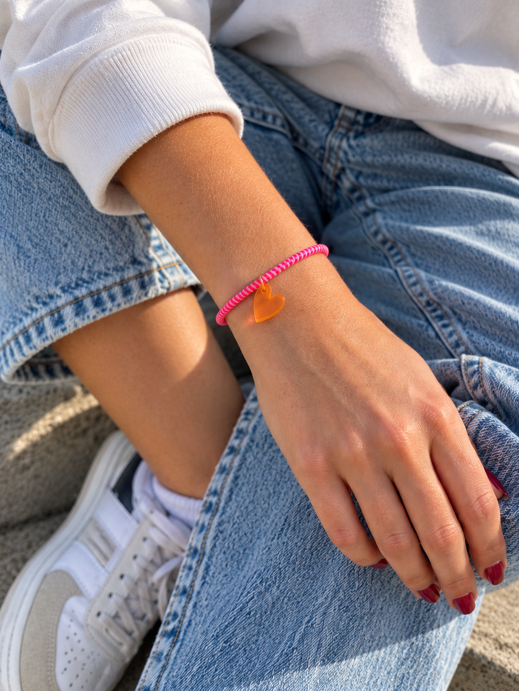 LUME CHARMS ARMBAND NEONPINK/ORANGE mit HERZ